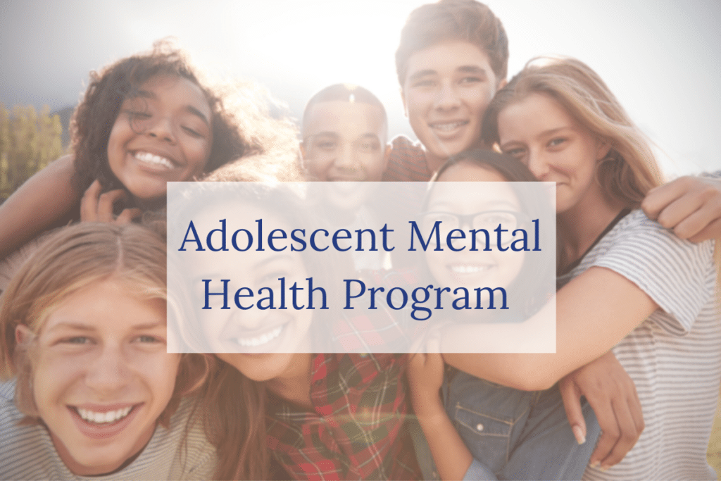 A group of smiling teenagers stand close together outdoors. Overlaid text reads “Adolescent Mental Health Program.” The image conveys positivity and support among adolescents.