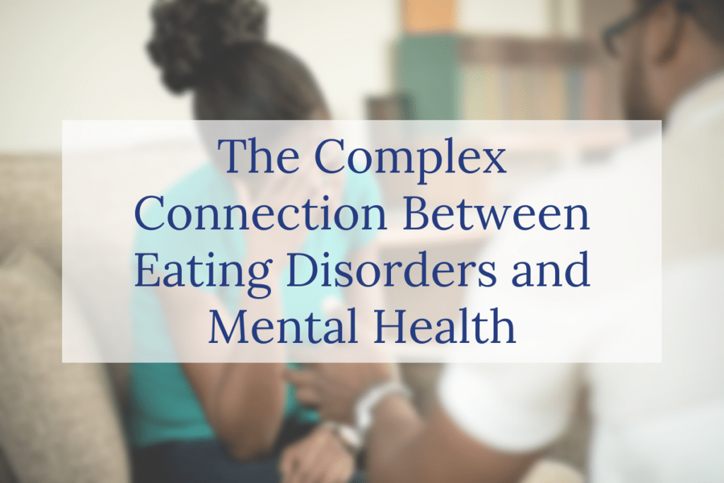 A blurred image of a person sitting on a couch with their head in their hands, while another person sits nearby. Text over the image reads, The Complex Connection Between Eating Disorders and Mental Health.
